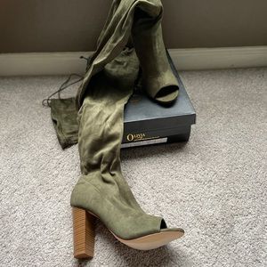 Tall, olive thigh high boot.